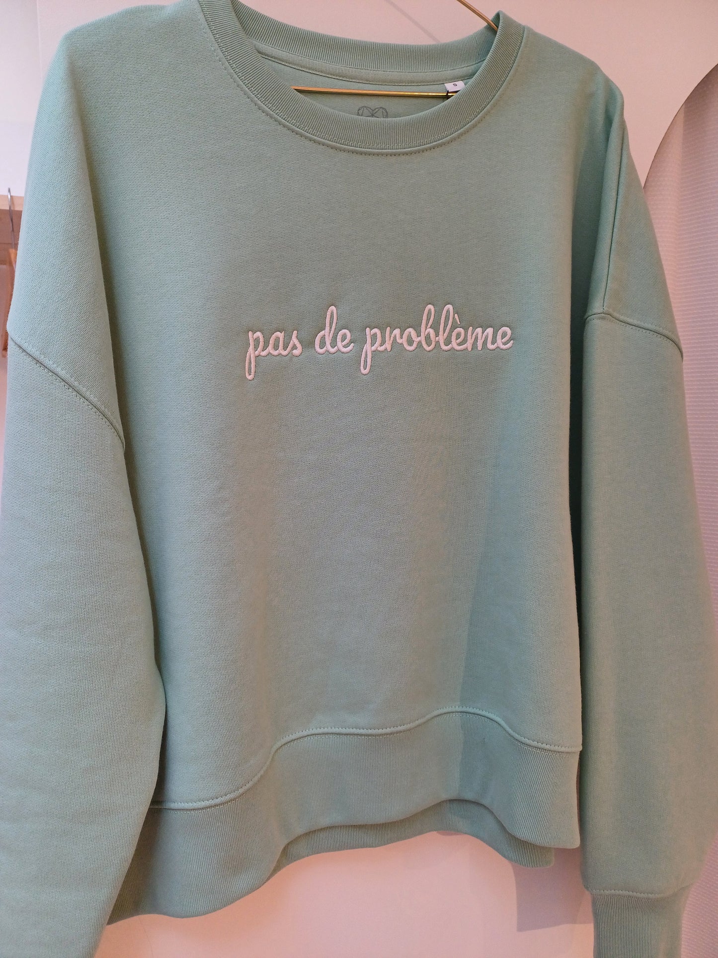 Green sweater Pas de problème